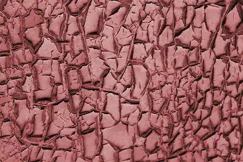 Mud Cracking defeito em revestimento industrial.